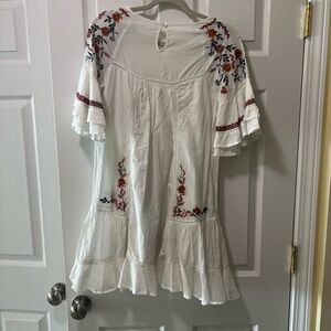 XS Free People white and floral fall fit and flare dress.